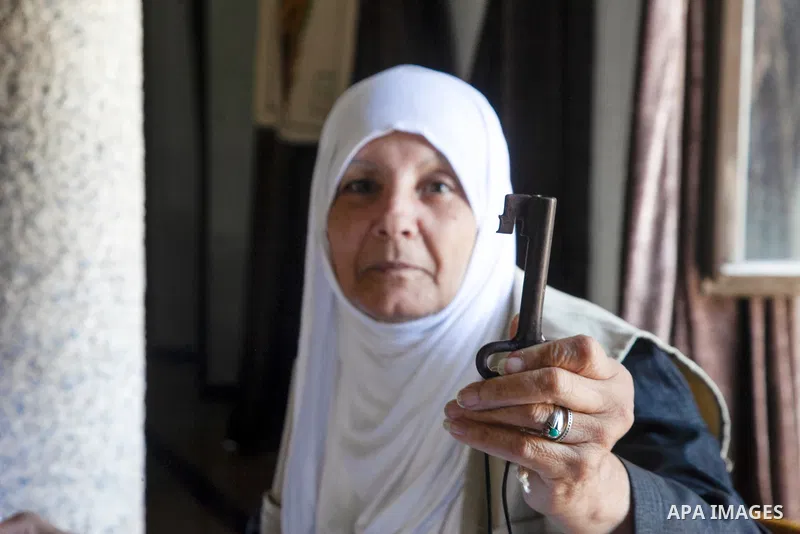 Palestinians attend the operetta and the art exhibition titled "Searching for Handala" on the 75th anniversary of the Palestinian Nakba, in Gaza city on June 4, 2023. "Nakba," which is the Arabic word for "catastrophe,"...