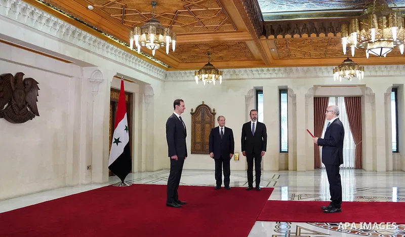 Syrian President Bashar al-Assad accepts the credentials of Muhammad al-Mahdhabi as Ambassador Extraordinary and Plenipotentiary of the Republic of Tunisia, in Damascus on June 8, 2023. Photo by Syrian Presidency\ apaima...