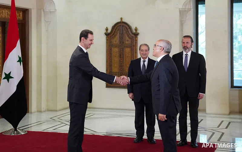 Syrian President Bashar al-Assad accepts the credentials of Muhammad al-Mahdhabi as Ambassador Extraordinary and Plenipotentiary of the Republic of Tunisia, in Damascus on June 8, 2023. Photo by Syrian Presidency\ apaima...