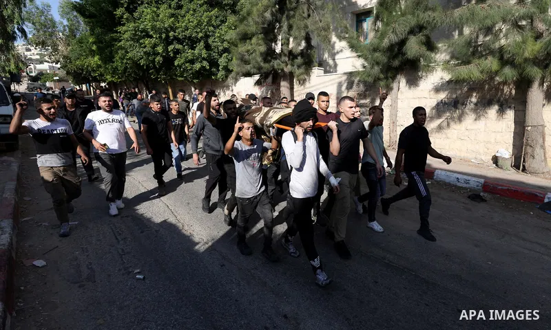 July 4, 2023, Jenin, West Bank, Occupied Territories: Palestinians carry a dead body evacuated from Jenin camp during the second day of an Israeli military operation in the camp, West Bank. The Israeli army stated on 03...