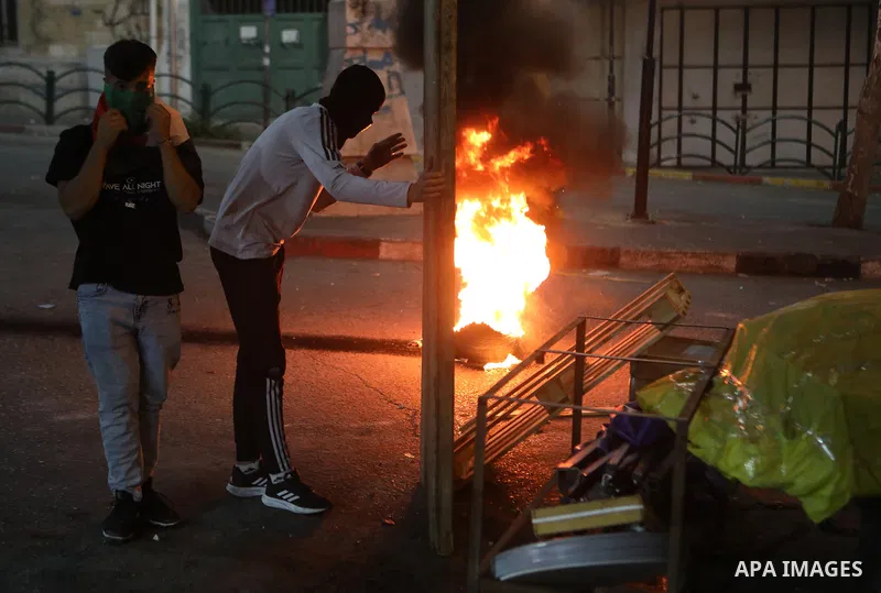 Palestinian protesters clash with Israeli forces following a demonstration in the West Bank city of Hebron protesting an Israeli military operation in Jenin for the second day, on July 4, 2023. Eight Palestinians were sh...