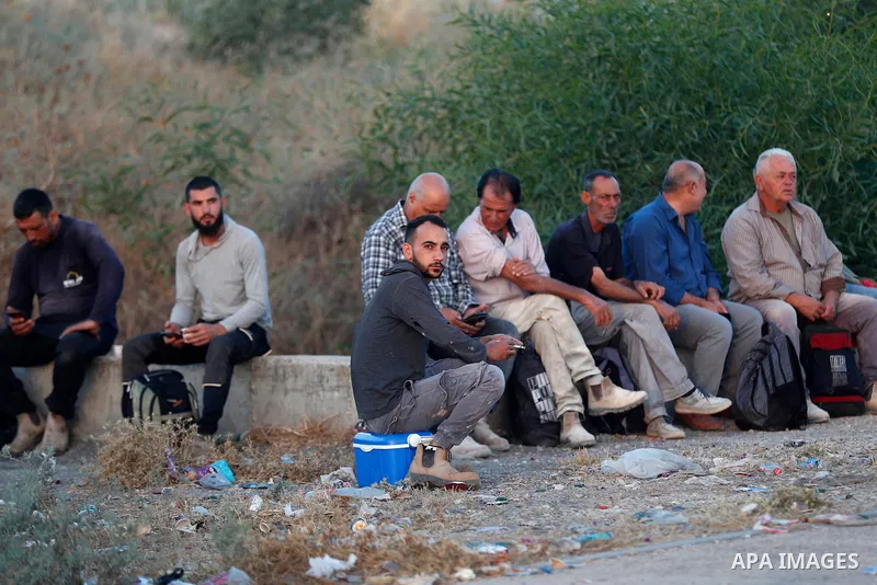 July 5, 2023, Jalameh, Israel: Jalameh (Israel), 05/07/2023.- Palestinian workers wait at Jalameh crossing near the West Bank city of Jenin, on their way to work in Israel, 05 July 2023. The Israeli army announced the wi...
