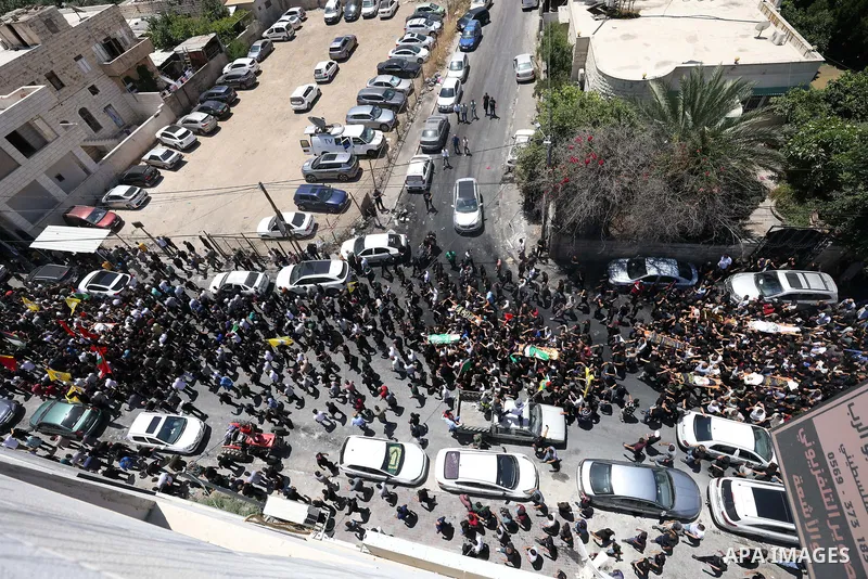 July 5, 2023, JENIN: Jenin (-), 05/07/2023.- An aerial view shows hundreds of Palestinian mourners join the procession during the funeral of 13 Palestinians killed in the Israeli army raid in the West Bank city of Jenin,...