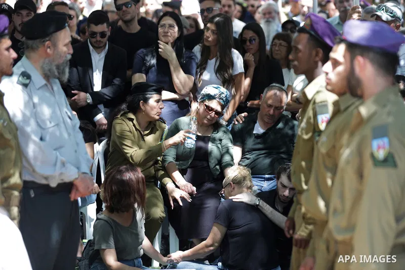 July 7, 2023, Jerusalem, -: Jerusalem (---), 07/07/2023.- Family members mourn during the funeral of Israeli soldier Shilo Amir in the mount Herzel military cemetery in Jerusalem, 07 July 2023. Amir was killed on 06 July...