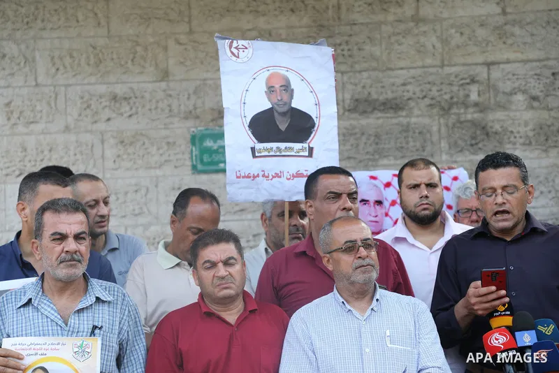 Palestinians take part in a protest in solidarity with prisones held in Israeli Jails in front of Red Cross Office in Gaza city on July 10, 2023. Over the past five decades, Israel, has detained over 800,000 Palestinians...