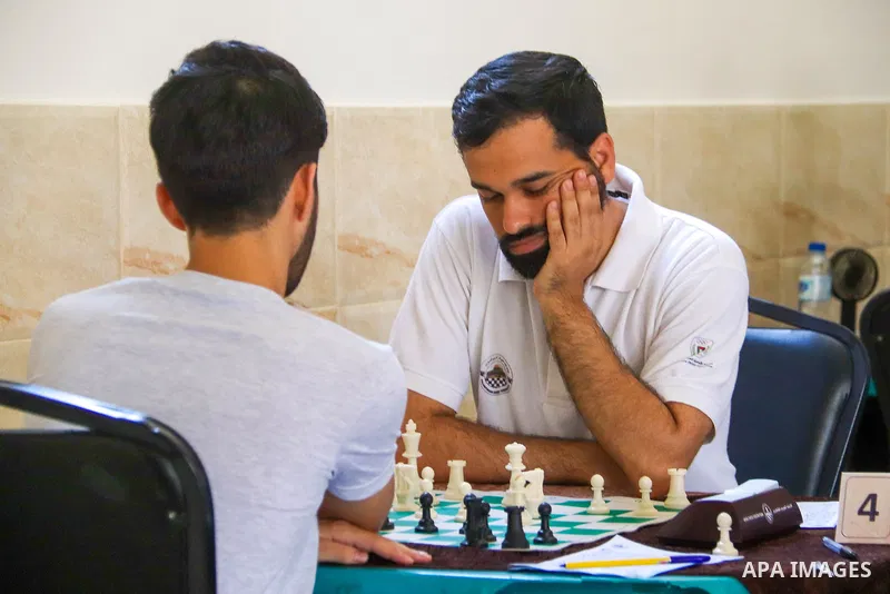 Palestinians compete during a local chess tournament in Gaza City on July 19, 2023. Photo by Hashem Zimmo\ apaimages