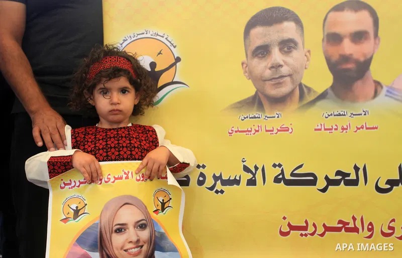 Palestinians take part in a protest in solidarity with prisones held in Israeli Jails in front of Red Cross Office in Gaza city on July 31, 2023. According to the latest figures from Addameer, the Palestinian Prisoner Su...