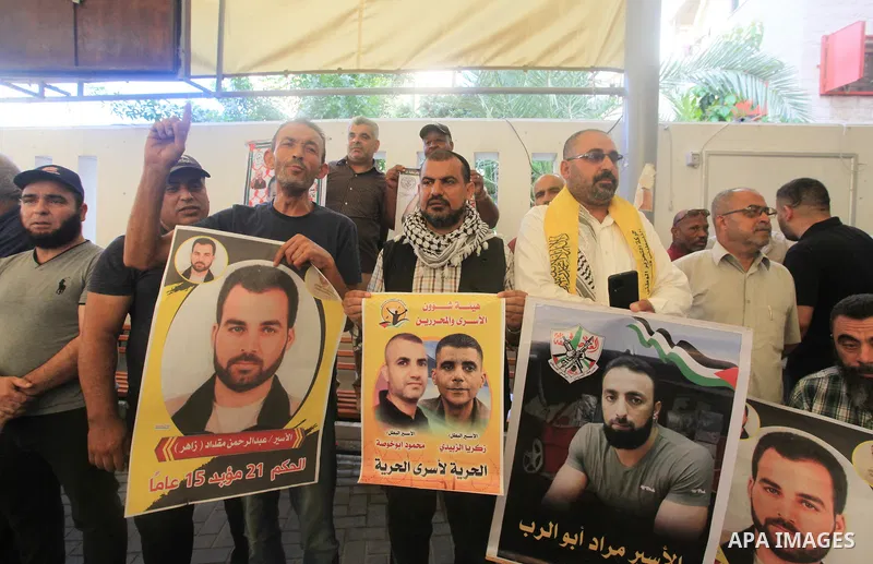 Palestinians take part in a protest in solidarity with prisones held in Israeli Jails in front of Red Cross Office in Gaza city on July 31, 2023. According to the latest figures from Addameer, the Palestinian Prisoner Su...
