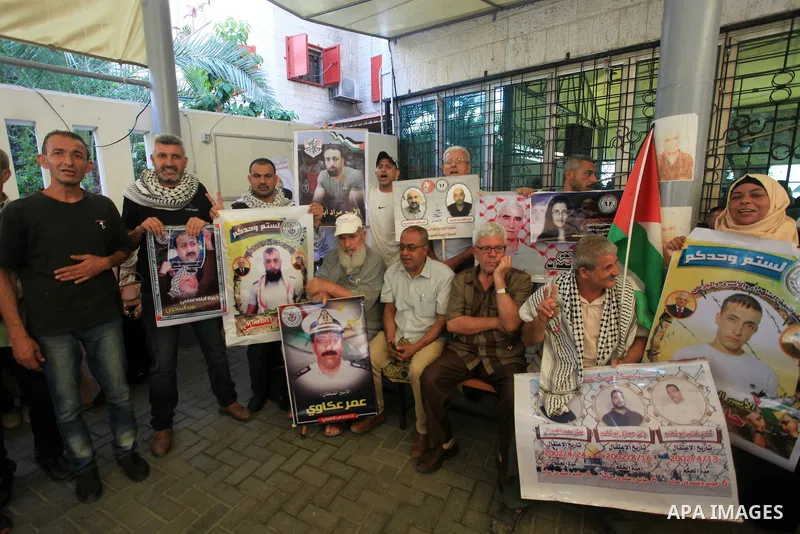 Palestinians take part in a protest in solidarity with prisones held in Israeli Jails in front of Red Cross Office in Gaza city on August 07, 2023. According to the latest figures from Addameer, the Palestinian Prisoner...