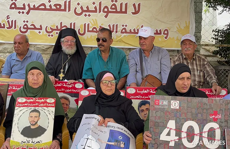 Palestinians take part in a protest to demand the return of the bodies of their slain relatives held by Israeli forces, in front of Red cross office in the West Bank city of Ramallah on August 29, 2023. Israeli authoriti...