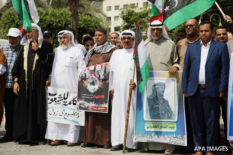 Palestinian factions participate in a rally to thank the Libyan people who against normalization in Gaza city, on August 31, 2023. Palestine thanked Libya on for reiterating its refusal to normalize ties with Israel. Lib...