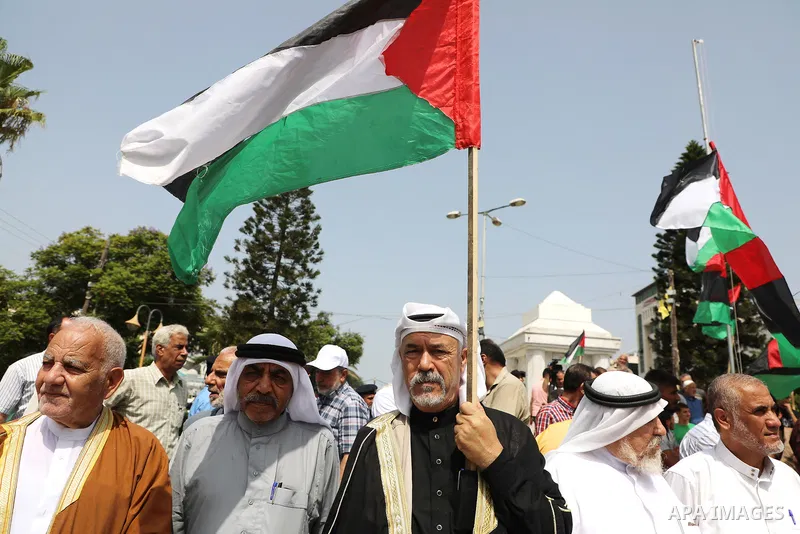 Palestinian factions participate in a rally to thank the Libyan people who against normalization in Gaza city, on August 31, 2023. Palestine thanked Libya on for reiterating its refusal to normalize ties with Israel. Lib...