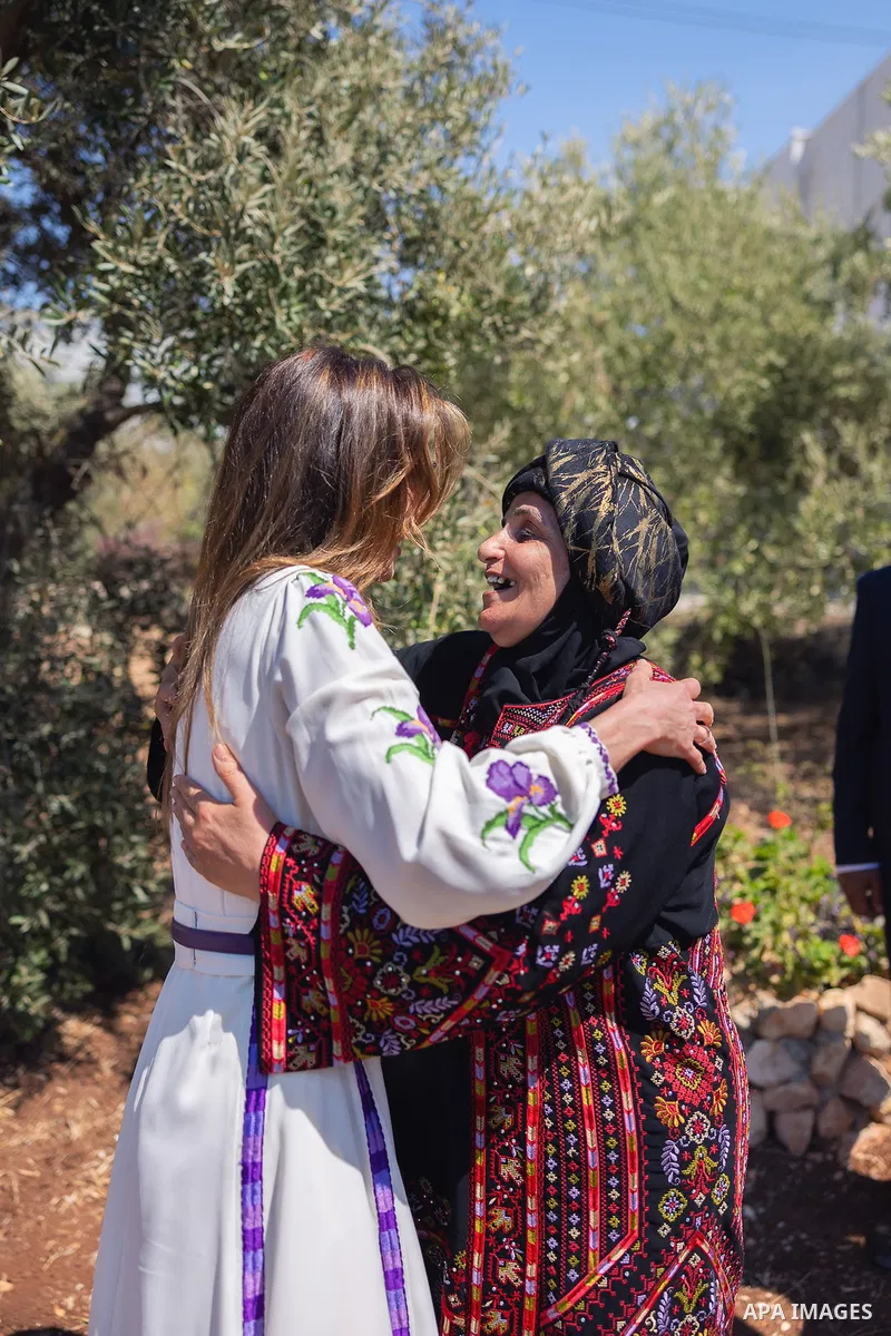 Queen Rania during a visit to Firyal Kofahi’s home-based kitchen business in Irbid governorate’s Hawar village, where she met with a group of women who work at the kitchen on August 31, 2023. Photo by Queen Rania\ apaima...