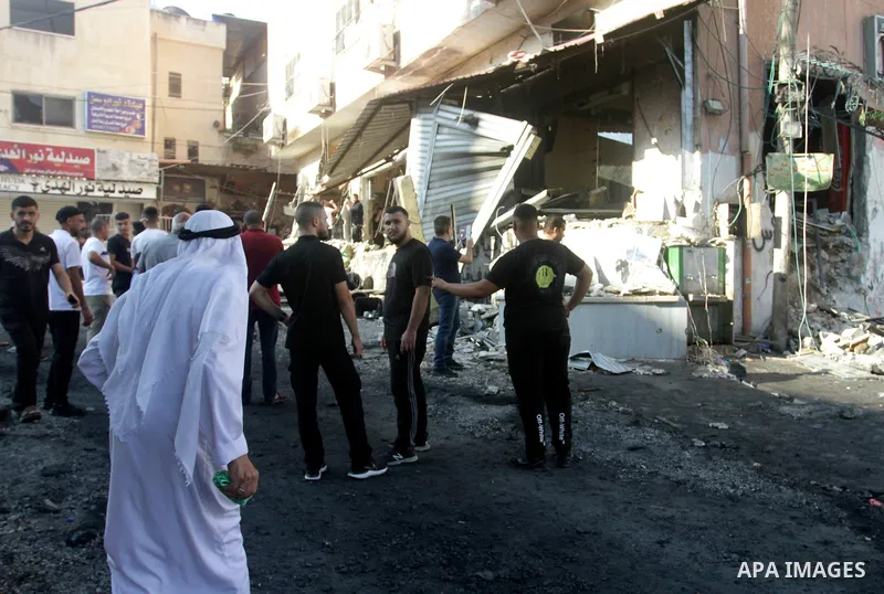 Palestinians examine the damaged houses after Israeli forces raid on the Palestinian refugee camp of Nur Shams in Tulkarm, West Bank on September 05, 2023. Palestinian youth, identified as Ayed Samih Abu Harb, 21, was ki...