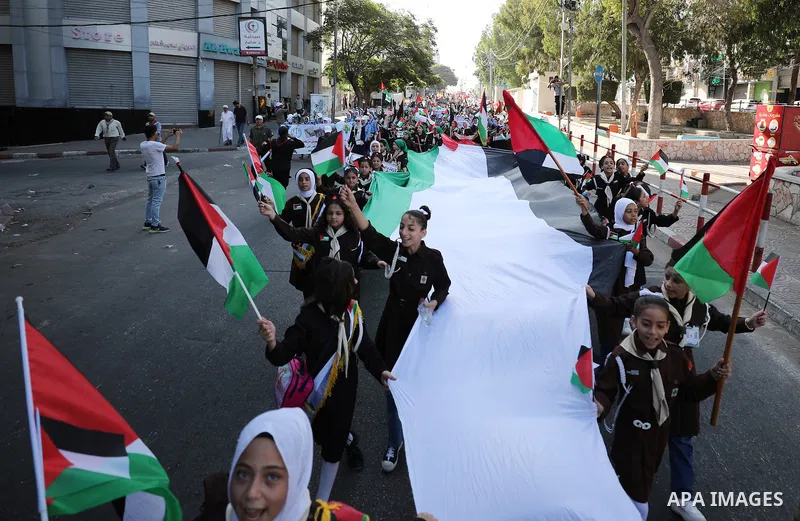 Palestinian children participate in a scouting march marking the anniversary of Israeli disengagement from Gaza, in Gaza city, on September 11, 2023. The Israeli disengagement from Gaza was the unilateral dismantling in...