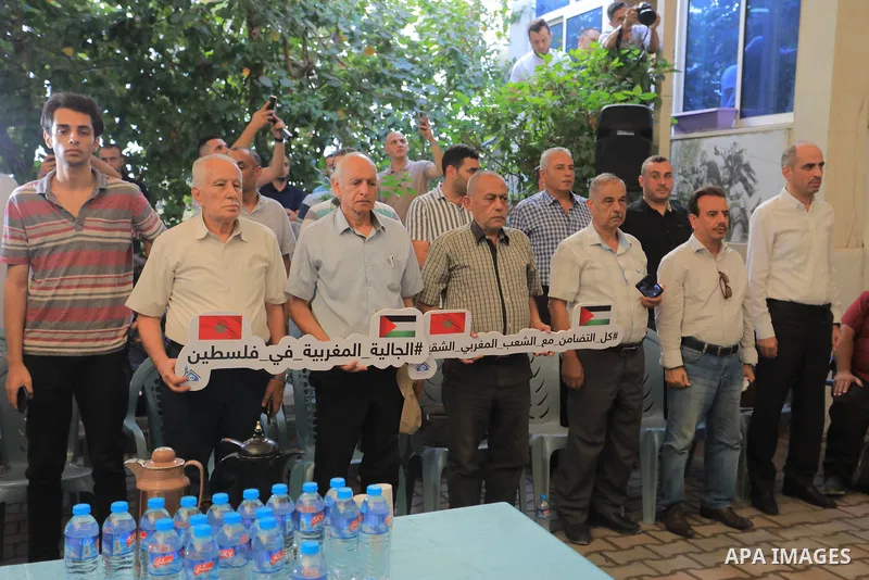 Palestinians and Moroccans take part in a stand in solidarity with Morocco after the devastating earthquake that struck the kingdom, in Gaza City, on September 11, 2023. Photo by Omar Ashtawy\ apaimages