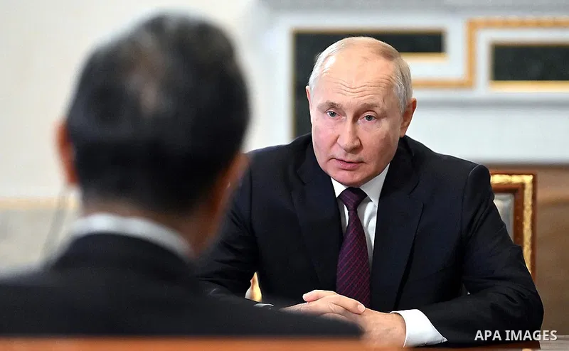 Russian President Vladimir Putin meets with a member of the Politburo of the Central Committee of the Communist Party of the People's Republic of China in the Konstantinovsky Palace, in Russia, on September 20, 2023. Pho...