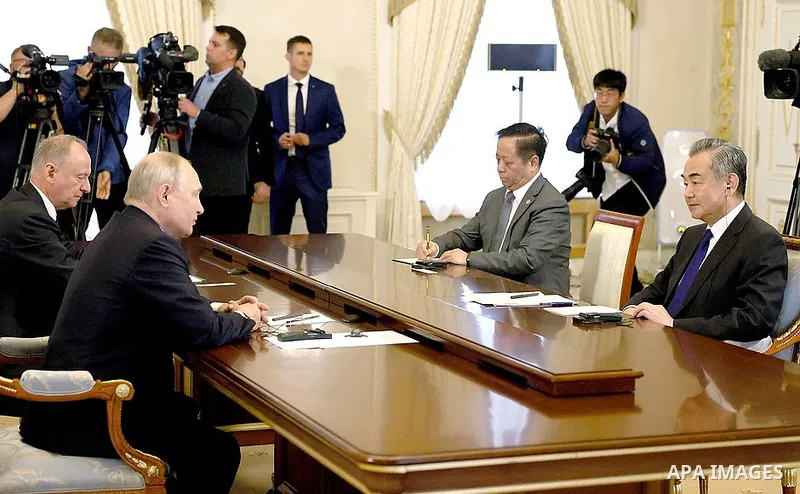 Russian President Vladimir Putin meets with a member of the Politburo of the Central Committee of the Communist Party of the People's Republic of China in the Konstantinovsky Palace, in Russia, on September 20, 2023. Pho...