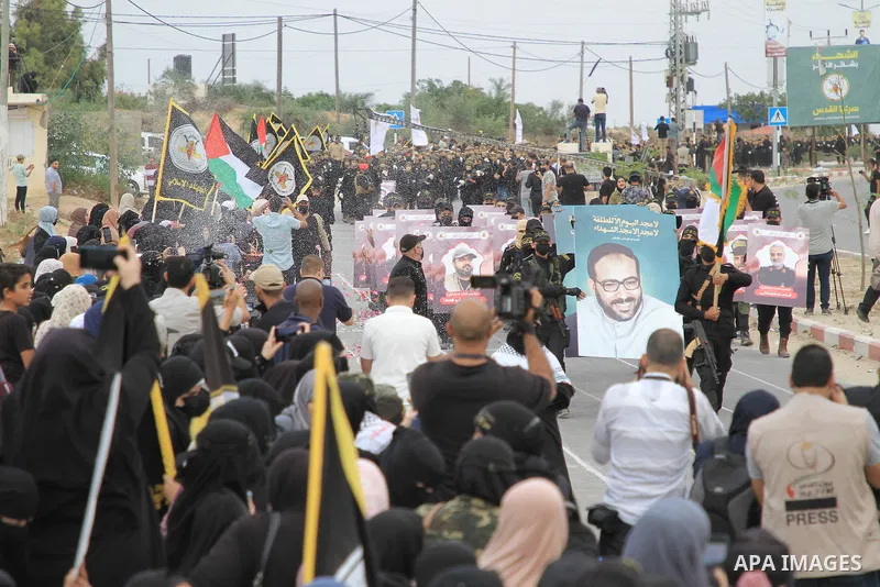 Fighters of the Al-Quds Brigades, the military wing of the Islamic Jihad movement in Palestine, participate in a military parade on the occasion of the movement’s 36th launch, in the central Gaza Strip on October 4, 2023...