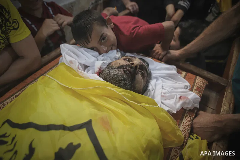 Mourners carry the bodies of Palestinians killed in the latest infiltration operation into Israel, in North of Gaza City on October 7, 2023. Palestinian militants have begun a "war" against Israel which they infiltrated...