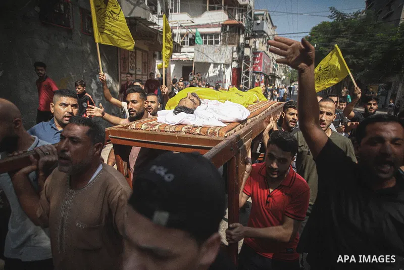 Mourners carry the bodies of Palestinians killed in the latest infiltration operation into Israel, in North of Gaza City on October 7, 2023. Palestinian militants have begun a "war" against Israel which they infiltrated...