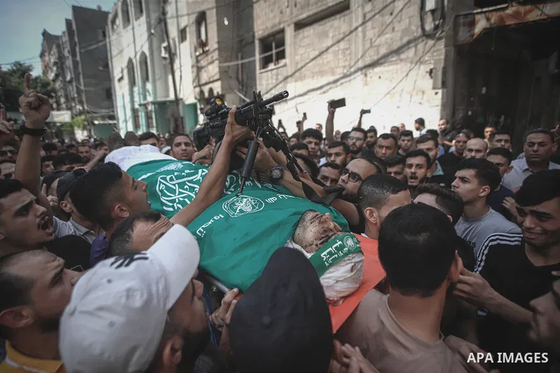 Mourners carry the bodies of Palestinians killed in the latest infiltration operation into Israel, in North of Gaza City on October 7, 2023. Palestinian militants have begun a "war" against Israel which they infiltrated...