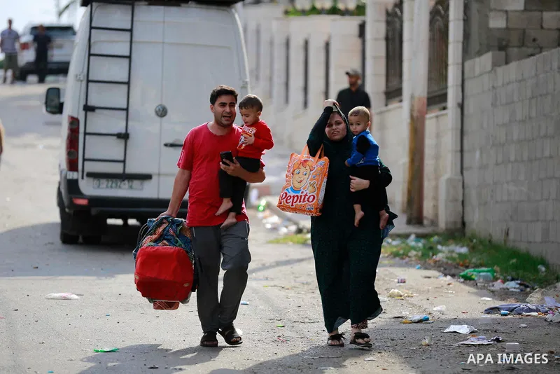 Palestinians inspect the damage following an Israeli airstrike on the El-Remal aera in Gaza City on October 9, 2023. Israel continued to battle Hamas fighters on October 10 and massed tens of thousands of troops and heav...