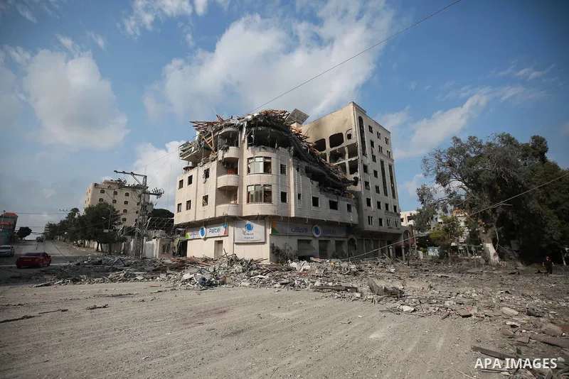 Palestinians inspect the damage following an Israeli airstrike on the El-Remal aera in Gaza City on October 9, 2023. Israel continued to battle Hamas fighters on October 10 and massed tens of thousands of troops and heav...