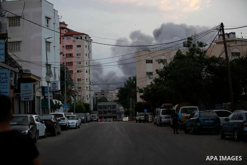 Smoke rises over the buildings after Israeli airstrikes in Gaza City, Gaza on October 10. Photo by Bashar Taleb\ apaimages