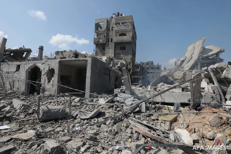 Palestinians inspect the damage following an Israeli airstrike on the El-Remal aera in Gaza City on October 9, 2023. Israel continued to battle Hamas fighters on October 10 and massed tens of thousands of troops and heav...