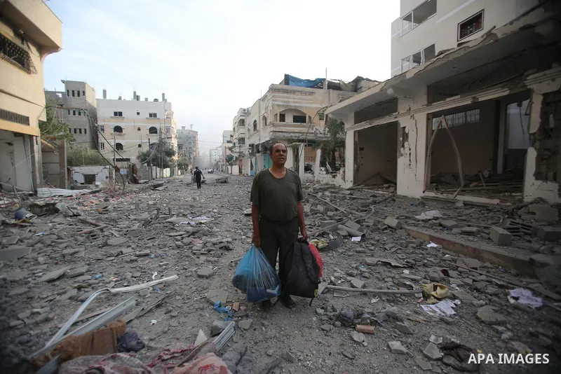 Palestinian families evacuates to safer areas following overnight Israeli shelling in Gaza city on October 11, 2023. Israel pounded Hamas targets in Gaza on October 11and said the bodies of 1,500 Islamist militants were...