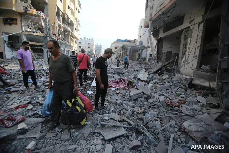 Palestinian families evacuates to safer areas following overnight Israeli shelling in Gaza city on October 11, 2023. Israel pounded Hamas targets in Gaza on October 11and said the bodies of 1,500 Islamist militants were...