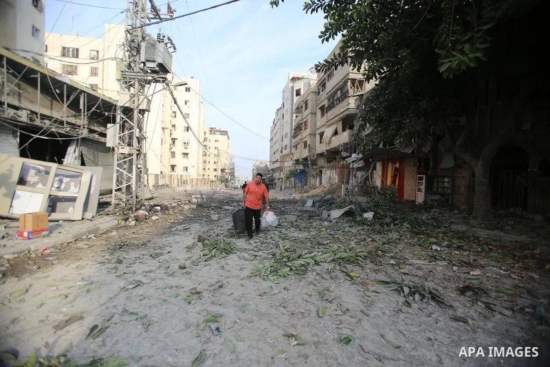 Palestinian families evacuates to safer areas following overnight Israeli shelling in Gaza city on October 11, 2023. Israel pounded Hamas targets in Gaza on October 11and said the bodies of 1,500 Islamist militants were...
