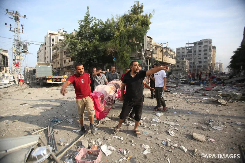 Palestinian families evacuates to safer areas following overnight Israeli shelling in Gaza city on October 11, 2023. Israel pounded Hamas targets in Gaza on October 11and said the bodies of 1,500 Islamist militants were...