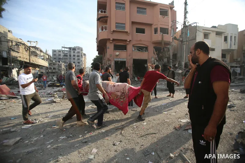 Palestinian families evacuates to safer areas following overnight Israeli shelling in Gaza city on October 11, 2023. Israel pounded Hamas targets in Gaza on October 11and said the bodies of 1,500 Islamist militants were...