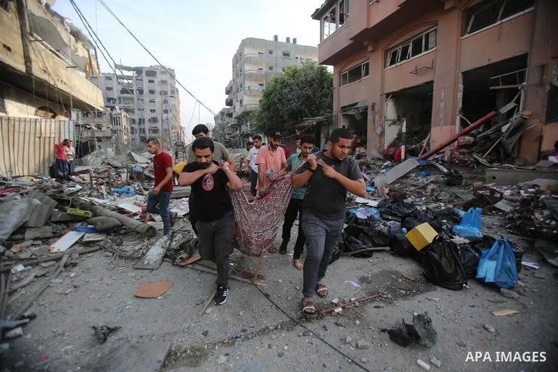 Palestinian families evacuates to safer areas following overnight Israeli shelling in Gaza city on October 11, 2023. Israel pounded Hamas targets in Gaza on October 11and said the bodies of 1,500 Islamist militants were...