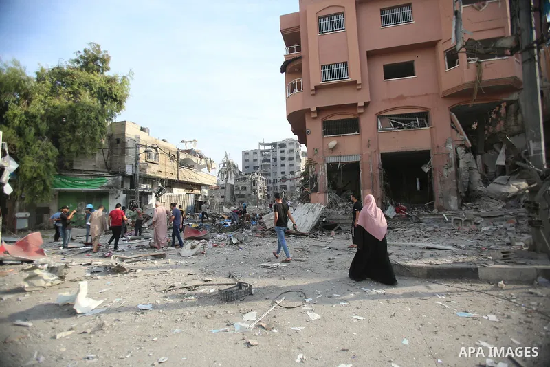 Palestinian families evacuates to safer areas following overnight Israeli shelling in Gaza city on October 11, 2023. Israel pounded Hamas targets in Gaza on October 11and said the bodies of 1,500 Islamist militants were...