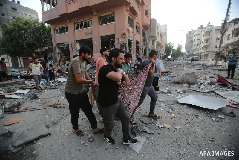Palestinian families evacuates to safer areas following overnight Israeli shelling in Gaza city on October 11, 2023. Israel pounded Hamas targets in Gaza on October 11and said the bodies of 1,500 Islamist militants were...