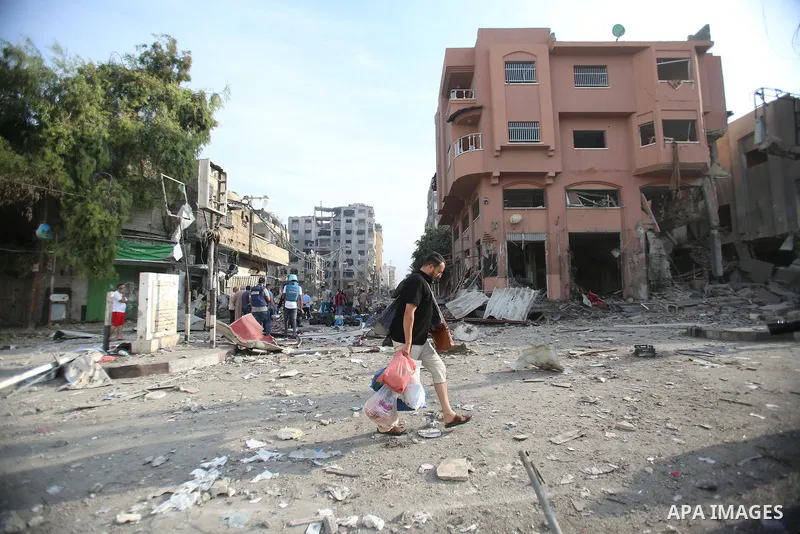 Palestinian families evacuates to safer areas following overnight Israeli shelling in Gaza city on October 11, 2023. Israel pounded Hamas targets in Gaza on October 11and said the bodies of 1,500 Islamist militants were...