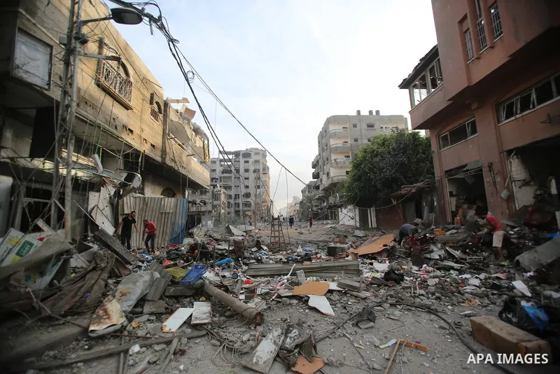 Palestinian families evacuates to safer areas following overnight Israeli shelling in Gaza city on October 11, 2023. Israel pounded Hamas targets in Gaza on October 11and said the bodies of 1,500 Islamist militants were...