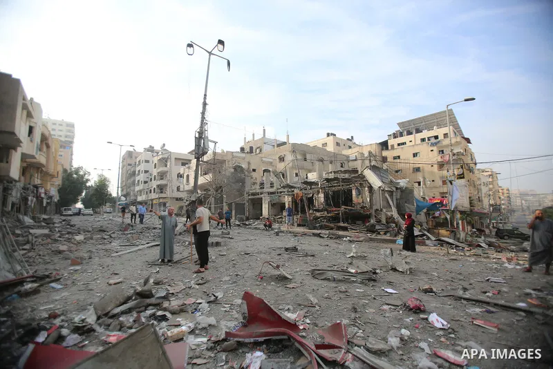 Palestinian families evacuates to safer areas following overnight Israeli shelling in Gaza city on October 11, 2023. Israel pounded Hamas targets in Gaza on October 11and said the bodies of 1,500 Islamist militants were...