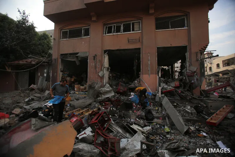 Palestinian families evacuates to safer areas following overnight Israeli shelling in Gaza city on October 11, 2023. Israel pounded Hamas targets in Gaza on October 11and said the bodies of 1,500 Islamist militants were...