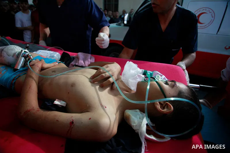 A Palestinian boy wounded in an Israeli army raid on Nur Shams refugee camp is brought to a hospital in Tulkarem, West Bank, on Thursday, Oct. 19, 2023. Photo by Mohammed Nasser\ APAimages