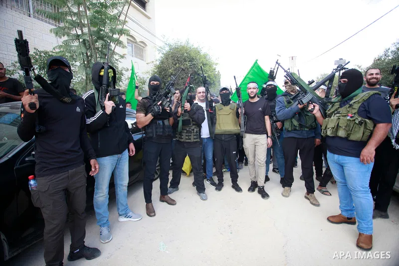 Mourners carry the bodies of six Palestinians, killed in a raid by Israeli troops, during their funeral in the town of Tulkarm in the north of the occupied West Bank on October 20, 2023. The death toll from a raid by Isr...
