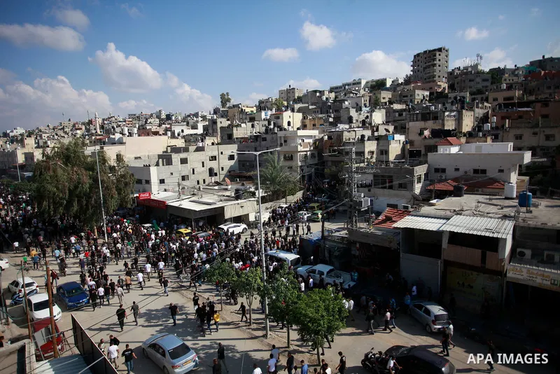 Mourners carry the bodies of six Palestinians, killed in a raid by Israeli troops, during their funeral in the town of Tulkarm in the north of the occupied West Bank on October 20, 2023. The death toll from a raid by Isr...