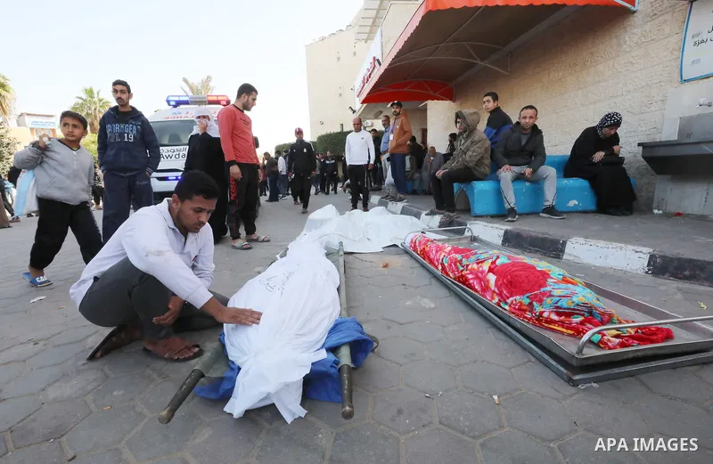 Bodies of the people, killed during Israeli bombardment, laid down in front of Al-Aqsa Hospital's morgue, on 23 November 2023. The ongoing battles between Israel and the Palestinian militant group Hamas continue on the 4...