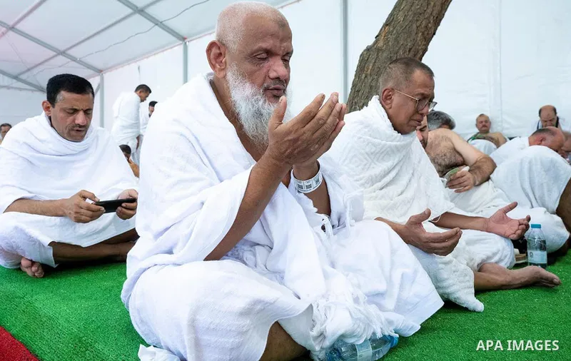 Muslim pilgrims rest inside their tent near the Mount Arafat, also known as Jabal al-Rahma or Mount of Mercy, during the climax of the Hajj pilgrimage on June 27, 2023. The ritual is the high point of the annual pilgrima...
