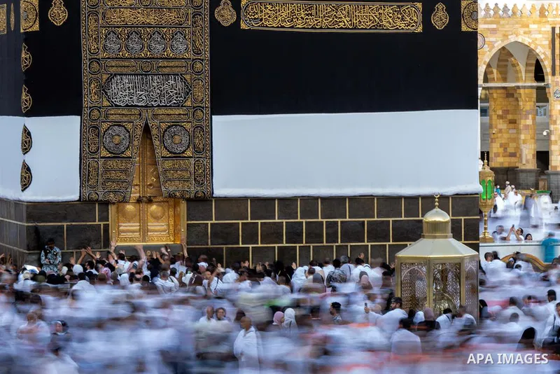 Muslim worshippers and pilgrims gather around the Kaaba, Islam's holiest shrine, at the Grand Mosque in the holy city of Mecca on June 26, 2023, as they arrive for the annual Hajj pilgrimage. Photo by Saudi Press Agency/...