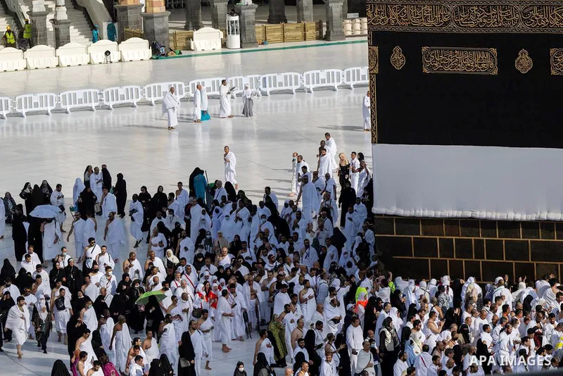 Muslim worshippers and pilgrims gather around the Kaaba, Islam's holiest shrine, at the Grand Mosque in the holy city of Mecca on June 26, 2023, as they arrive for the annual Hajj pilgrimage. Photo by Saudi Press Agency/...