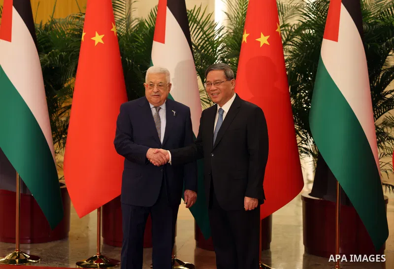 Palestinian President Mahmoud Abbas meets with the Prime Minister of China in Beijing, China on June 14, 2023. Photo by Thaer Ganaim\ apaimages